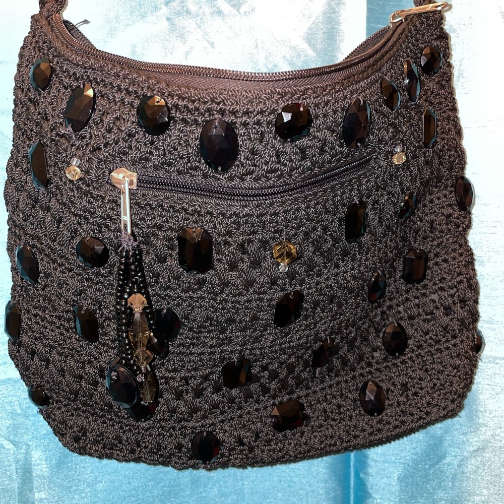 Black crochet purse with long strap and jewels detail! Unbranded (YKK) like Sak!